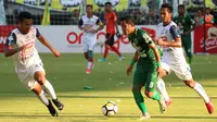 Persebaya Surabaya berhasil mengalahkan Arema FC dengan skor 1-0 pada pertadingan pekan ketujuh Liga 1 2018. (Bola.com/Aditya Wani)