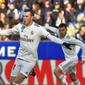 Striker Real Madrid, Gareth Bale, merayakan gol ke gawang Huesca pada laga La Liga di Stadion El Alcoraz, Huesca, Minggu (9/12/2018). (AFP/Ander Gillenea)