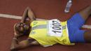 Pelari Papua tampak lelah saat Kejurnas Atletik nomor lari estafet 4x400 meter putra senior di Stadion Pakansari, Bogor, Selasa (6/8). Kejurnas tahun ini juga dilakukan untuk kualifikasi jelang PON. (Bola.com/Vitalis Yogi Trisna)