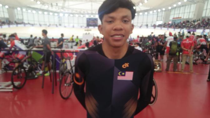 (Foto: Doc. asianparagames2018.id) Pebalap sepeda Malaysia, Mohamad Yusof Hafizi Shaharuddin mendapat medali perak saat ebrtanding Jakarta International Velodrome, Sabtu (13/10/2018).