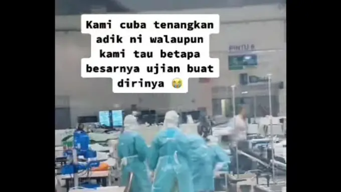 Aksi Haru Nakes Tenangkan Anak Kecil yang Kehilangan Ibunya saat di Ruang Isolasi