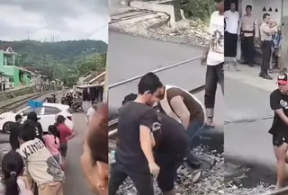 Aksi nekat warga memblokir perlintasan kereta api di Bandar Lampung viral di media sosial. (Tangkapan Layar Instagram).