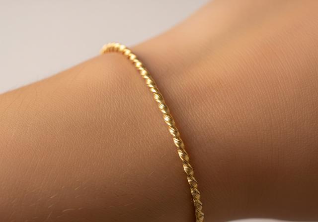 Gelang Rantai Twist Tipis/ Model Gelang Emas Rantai Tipis Harga Rp500 Ribuan (Sumber: gemini.com)