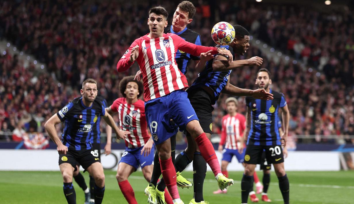 Kepastian Atletico Madrid lolos ke perempat final ditentukan lewat drama adu penalti setelah imbang agregat gol (2-2) melawan Inter Milan di 16 besar Liga Champions 2023/2024. (Thomas COEX/AFP)
