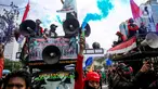 Massa buruh menyalakan asap suar saat unjuk rasa di Patung Kuda, Jakarta, Kamis (22/10/2020). Aksi gabungan buruh, petani, mahasiswa, dan pelajar dilakukan untuk menyuarakan penolakan pengesahan UU Cipta Kerja dan meminta Presiden mengeluarkan Perppu. (Liputan6.com/Faizal Fanani)