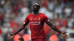 2019 : Sadio Mane - Bersama Liverpool pemain  kelahiran Senegal ini akhirnya berhasil menyabet penghargaan pemain terbaik Benua Afrika 2019. (AFP/Bulent Kilic)