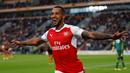 Ekspresi pemain Arsenal, Theo Walcott, setelah mencetak gol kedua ke gawang Hull City pada laga lanjutan Premier League, di KCOM Stadium, Sabtu (17/9/20106). (Reuters/Russell Cheyne)