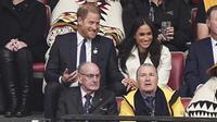 Pangeran Harry dan Meghan Markle menghadiri upacara pembukaan Invictus Games 2025 di Kanada, Sabtu, 8 Februari 2025. (dok. Aaron Chown/PA via AP)