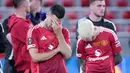Pemain Manchester United tertunduk lesu setelah ditaklukkan Tottenham Hotspur pada laga final Liga Europa di Stadion Mames, Bilbao, Spanyol, Kamis (22/5/2025). (AP Photo/Bernat Armangue)