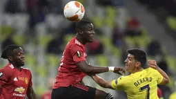 Eric Bailly. Dipercaya untuk menggantikan peran Harry Maguire, dirinya tampil lugas di lini belakang. Nilai minusnya adalah sering keluar ke area yang tak seharusnya dan membuat pelanggaran yang mengakibatkan terjadinya beberapa kali tendangan bebas. Poin 6,5 untuknya. (AP/Adam Warzawa/Pool)