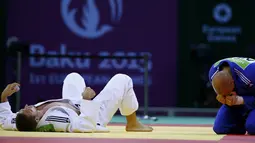 Ekspresi pejudo Belanda, Henk Grol (kanan), setelah mengalahkan Lukas Krpalek dari Republik Ceska di kelas 100 kg judo Pesta Olah Raga Eropa 2015 di Baku, Azerbaijan. (27/6). (REUTERS/Stoyan Nenov)