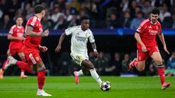 Pada leg pertama, Vinicius juga menjadi kunci kesuksesan Los Blancos dalam laga penuh tensi di kandang Benfica, Estadio Da Luz. (AP Photo/Manu Fernandez)