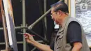 Sederet karya lukis milik SBY juga ditampilkan di panggung. (Liputan6.com/Herman Zakharia)