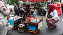 Kegiatan yang menampilkan berbagai kesenian, perlombaan dan makanan tradisional Betawi serta bazar UMKM itu mengusung tema Sukses Tenabang Untuk Indonesia. (Liputan6.com/Angga Yuniar)