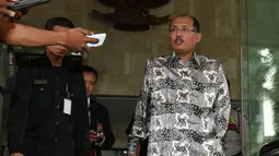 Janedjri M Gaffar diperiksa sebagai saksi terkait kasus suap sengketa Pilkada Lebak yang melibatkan mantan Ketua MK Akil Mochtar, Jakarta, (22/10/14). (Liputan6.com/Miftahul Hayat)