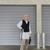 Layering outfit bisa membuat tampilan tubuh lebih berisi. (Instagram/helminursifah).
