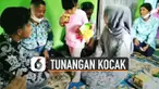 Tingkah polos bocah memang tidak bisa ditebak. Seperti kejadian bocah perempuan ini dengan santainya duduk di pasangan perempuan ketika prosesi tukar cincin.