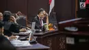 Ekpresi Ketua Tim Hukum Prabowo-Sandiaga, Bambang Widjojanto saat mengikuti sidang putusan sengketa Pilpres 2019 di Gedung Mahkamah Konstitusi (MK), Jakarta, Kamis (27/6/2019). MK akan membacakan putusan sengketa Pilpres 2019 yang dimohonkan kubu Prabowo-Sandiaga. (Liputan6.com/Faizal Fanani)