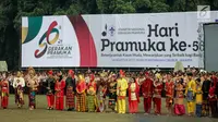 Peserta mengikuti upacara Hari Pramuka ke-56 serta pembukaan Raimuna Nasional XI, Jakarta, Senin (13/8). Penyelenggaraan ini menghadirkan perwakilan tiap kabupaten/kota, masing-masing 24 orang dari seluruh Indonesia. (Liputan6.com/Faizal Fanani)