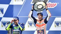 Bahkan mantan pebalap Itali Loris Reggiani menyebutkan bahwa cedera yang dialami Marc Marquez saat ini merupakan karma lantaran telah menggagalkan The Doctor jadi juara dunia MotoGP 2015. (Foto: AFP/Paul Crock)