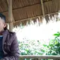 Seorang pengunjung sedang mencicipi espreso plus kayu manis di kafe Seladang, Kecamatan Wih Pesam, Kabupaten Bener Meriah (Liputan6.com/Rino Abonita)