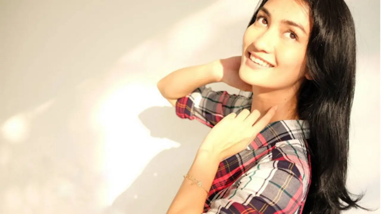 Atiqah Hasiholan 