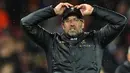 Ekspresi Pelatih Livepool, Jurgen klopp, ketika tim asuhannya kebobolan saat melawan Bayern Munchen pada laga Liga Champions, (19/2/2019). (AFP/Oli Scarff)