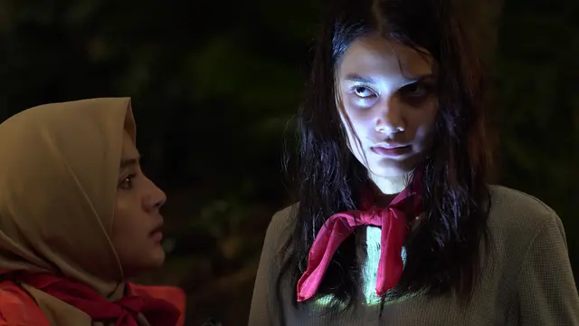 Salah satu adegan film Kemah Terlarang Kesurupan Massal. (Foto: Dok. Rapi Films)