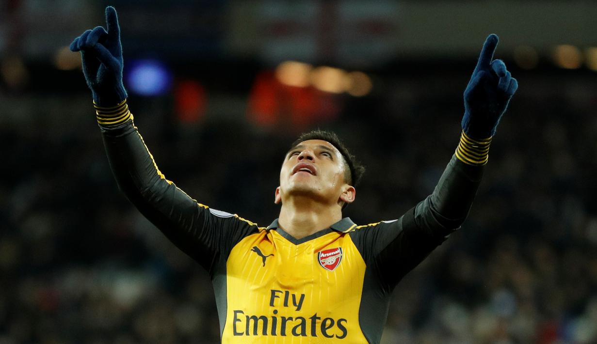 Ekspresi Alexis Sanchez setelah mencetak gol ketiga ke gawang West Ham United. (Action Images via Reuters/John Sibley)