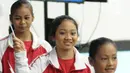 Atlet senam junior Indonesia melakukan defile saat pembukaan Kejuaraan Junior Senam Artistik Asia ke-15 di Istora Senayan, Jakarta, Rabu (25/4). Di ajang ini wadah bagi atlet Indonesia jelang laga di Asian Games 2018. (Liputan6.com/Helmi Fithriansyah)