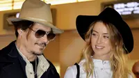 Johnny Depp dan Amber Heard. (foto: entertainmentwise)