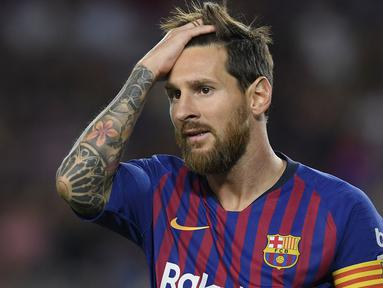 Lionel Messi saat ini menyandang status bebas transfer. Kontraknya dengan Barcelona sudah selesai pada 30 Juni 2021 kemarin. Jika tak ada pembaruan ikatan kerja, Messi bisa pergi secara cuma-cuma. Selain dirinya, berikut 5 pemain bintang yang berlabel gratisan. (Foto: AFP/Lluis Gene)