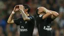 Ekspresi pemain PSG Angel Di Maria dan Thiago Motta  pada lanjutan Liga Champions Grup A di Stadion Santiago Bernabeu, Madrid, Rabu(4/11/2015) dini hari. Madrid menang tipis 1-0.  (Reuters / Sergio Perez)