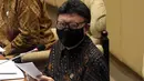Menteri Pendayagunaan Aparatur Negara dan Reformasi Birokrasi (PANRB) Tjahjo Kumolo mengikuti rapat kerja dengan Komisi II DPR di Kompleks Parlemen, Senayan, Jakarta, Rabu (24/3/2021). Rapat kerja tersebut membahas rekrutmen CPNS tahun 2021. (Liputan6.com/Angga Yuniar)