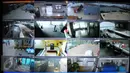 Layar menunjukkan tayangan langsung kamera CCTV di sejumlah Lapas di Control Room Kami Pasti di Gedung Kemenkumham, Jakarta, Jumat (30/10). Menkumham Yasonna meluncurkan ruang pengawasan yang bisa memantau situasi di 8 lapas. (Liputan6.com/Helmi Afandi)