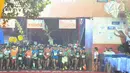 Peserta mengikuti Borobudur Marathon 2018 di Pelataran Taman Lumbini Borobudur Magelang, Minggu (18/11). Peserta Marathon terbagi 3 kategori, yakni Full Marathon 2.883 orang, Half Marathon 3.888 orang dan 10K sebanyak 2.901 orang. (Liputan6.com/Gholib)