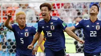 Timnas Jepang merayakan gol yang dibuat Yuya Osako ke gawang Kolombia di Piala Dunia 2018. (Jack GUEZ / AFP).