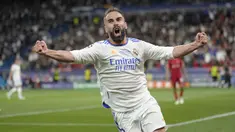 Dani Carvajal sempat dibuat kerepotan barisan penyerang Liverpool. Namun di babak kedua ia mampu mengatasi tekanan dan sesekali maju membantu serangan. (AP/Kirsty Wigglesworth)