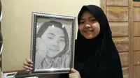 Nazila Putri Rutansyah, remaja penyandang disabilitas rungu atau Tuli asal Lebak, Banten yang pandai melukis. Foto. Doc Pribadi.