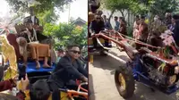Viral Pengantin Pria Diarak Pakai Traktor Keliling Kampung, Bak Raja Sehari. (Sumber: TikTok/andikjurnalis)
