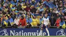 Pemain Inggris, Harry Kane, melakukan selebrasi setelah mencetak gol ke gawang Ukraina pada laga Kualifikasi Euro 2024 Grup C di Stadion Wembley, Minggu (26/3/2023). Berkat hasil ini, Inggris untuk sementara berhak memuncaki klasemen Grup C dengan poin 6. (AP Photo/Ian Walton)