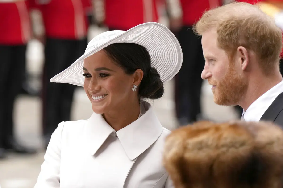 Meghan Markle dan Pangeran Harry. (AP Photo/Matt Dunham, Pool)