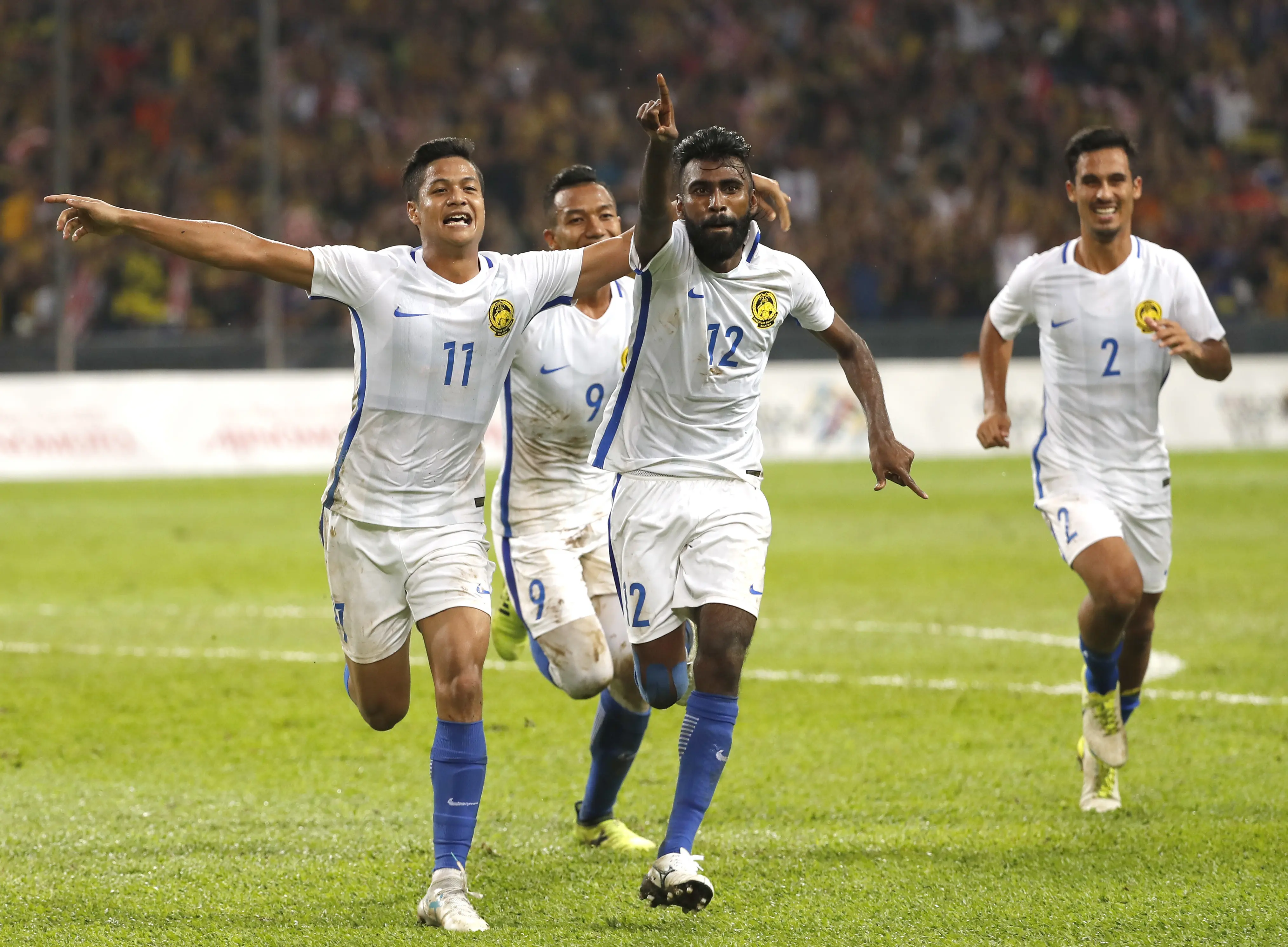 Thanabalan Nadarajah saat rayakan gol ke gawang Timnas iNDONESIA (AP Photo/Vincent Thian)