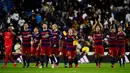 Pemain Barcelona merayakan kemenangan atas Real Madrid 4-0 dalam laga La Liga Spanyol di Stadion Santiago Bernabeu, Madrid, Minggu (22/11/2015) dini hari WIB. (AFP Photo/Pierre-Philippe Marcou)