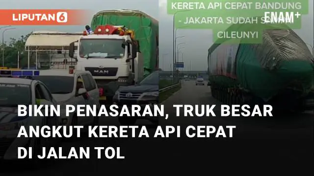 Sebuah truk besar angkut kereta cepat di jalan tol mengundang perhatian