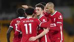 Para pemain Liverpool merayakan gol yang dibuat striker Diogo Jota (kedua dari kanan) ke gawang Wolverhampton Wanderers dalam laga lanjutan Liga Inggris 2020/2021 pekan ke-28 di Molineux Stadium, Senin (15/3/2021). Liverpool menang 1-0 atas Wolverhampton. (AP/Laurence Griffiths/Pool)