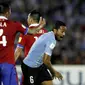 Alvaro Pereira merayakan gol ke gawang Chile (Reuters)