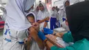 Paramedis Puseksmas Cinere menyuntikkan vaksin imunisasi HPV (Human Papillomavirus) ke murid kelas V sekolah dasar (SD) saat pelaksanaan Bulan Imunisasi Anak Sekolah (BIAS) 2026 di SDN Gandul 1, Depok, Jawa Barat, Kamis, 06 Agustus 2026. (KLY/Arie Basuki).