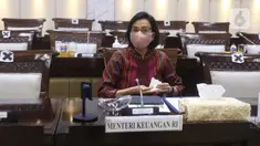 Menkeu Sri Mulyani bersiap mengikuti rapat kerja dengan Komisi XI DPR di Kompleks Parlemen, Senayan, Jakarta, Senin (15/3/2021). Rapat membahas konsultasi terkait usulan perubahan pengelompokan/skema barang kena pajak berupa kendaraan bermotor yang dikenai PPnBM. (Liputan6.com/Angga Yuniar)