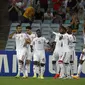 Pemain Uni Emirat Arab bersorak usai cetak gol (Reuters)